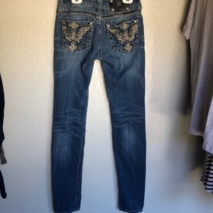 Distressed Miss Me denim